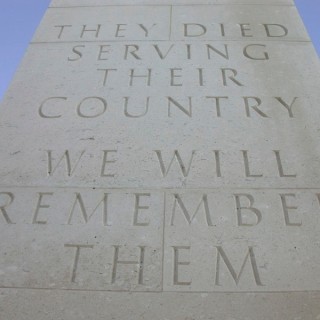 Inscription on the National Services Memorial at The National Memorial Arboretum, "They died serving their country. We will remember them"